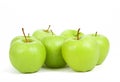 Seven green apples isolated on a white background