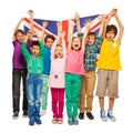 Seven kids raised their hands up with English flag Royalty Free Stock Photo