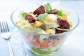 Seven-layer salad with egg, tuna, dried tomatoes