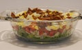 Seven Layer Salad in a glass dish