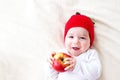 Seven month old baby with apples Royalty Free Stock Photo