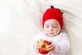 Seven month old baby with apples Royalty Free Stock Photo