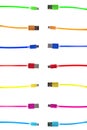 Seven multi-colored usb cables, with connectors under the micro, the different ends of the cable pointing towards each other, on a Royalty Free Stock Photo