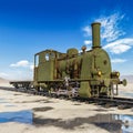 Seven o`clock train after rain on desert