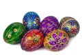 Seven pieces of bright beautiful hand-painted Easter eggs. Isolated image on white Royalty Free Stock Photo