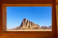 Seven Pillars of Wisdom via a window, in Wadi Rum Royalty Free Stock Photo