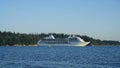 Seven Seas Mariner cruise ship from Regent Seven Seas luxury cruise line past the famous Stanley Park in Vancouver for a seven-day Royalty Free Stock Photo