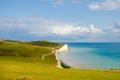 Seven sisters cliffs in England on the sunny day in summer. Chalk cliffs and azure water. Royalty Free Stock Photo