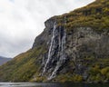 The Seven Sisters waterfall Norwegian: De Syv SÃÂ¸strene, KnivsflÃÂ¥fossen located along the Geirangerfjorden in Stranda Royalty Free Stock Photo