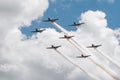 Seven AT-6 Texans With Smoke Trails