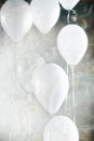 Seven White Balloons