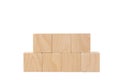 Seven wooden cubes stacked in the form of a pyramid. White isolated background. Copy space
