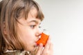 Seven year old girl breathing asthmatic medicine healthcare inhaler