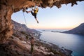 Seven-year old girl climbing a challenging route