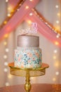 Seventy years anniversary celebration birthday cake simple peachy flowers close