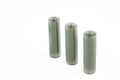 Several AA batteries in perspective closeup view on white background Royalty Free Stock Photo