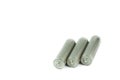 Several AA batteries in perspective closeup view on white background Royalty Free Stock Photo