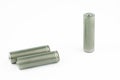Several AA batteries in perspective closeup view on white background Royalty Free Stock Photo