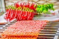 Several Adana Kebab skewers lined up