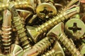 Several anodized screws background Royalty Free Stock Photo