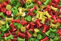 several assorted colors of plastic push pins