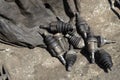 Several auto parts on the ground in a rustic setting Royalty Free Stock Photo