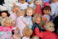 Several baby dolls on sale at the flea market