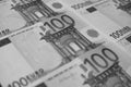 Several banknotes of 100 euros close-up, monochrome Royalty Free Stock Photo