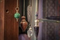 Several Beautiful Crystal Pendulums Hanging on Display