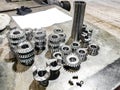 Several bevel gears are in the warehouse after being machined on the machine