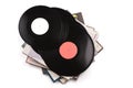 Several big black vinyl records lying on the cardboard covers. Royalty Free Stock Photo