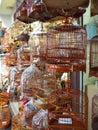 Several bird cages are offered for sale at the bird market at Yuen Po Street Bird Garden