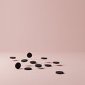 Several black discs appear against a smooth, pinkish background. The discs are Royalty Free Stock Photo