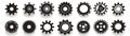 Several black gears casting shadows on a white backdrop Royalty Free Stock Photo
