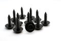 Several black tapping screws in a group on Royalty Free Stock Photo