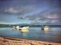 Boats anchored on a lake in Michigan. Royalty Free Stock Photo