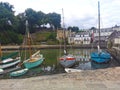 Several boats moored in calm lake water in Auray Bretagne, French