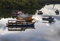 Several boats moored. Reflection of the sky in the sea. Royalty Free Stock Photo