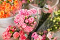 Several bouquets of carnation ready for sale in a street flower market Royalty Free Stock Photo
