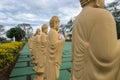 Several Buddha statues in perspective at the buddhist temple