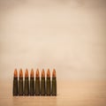 Several bullets on a wooden background Royalty Free Stock Photo