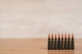 Several bullets on a wooden background Royalty Free Stock Photo