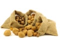 Several burlap bags with mixed nuts Royalty Free Stock Photo