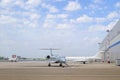 Several business jets on an airport apron. Private or business aviation. Silver and white planes Royalty Free Stock Photo