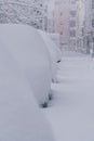 Several cars in the street in Madrid covered in snow due to historic snow storm Filomena Royalty Free Stock Photo