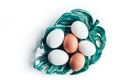 Several chicken eggs lie on a ceramic plate Royalty Free Stock Photo