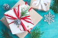 Several Christmas boxes of gifts festively decorated On a turquoise background, selective focus Royalty Free Stock Photo