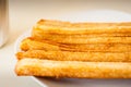 Several churros on small plate