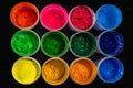 several color plastisol ink cans in factory