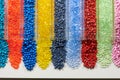 several colored plastic resins in test tubes in laboratory Royalty Free Stock Photo